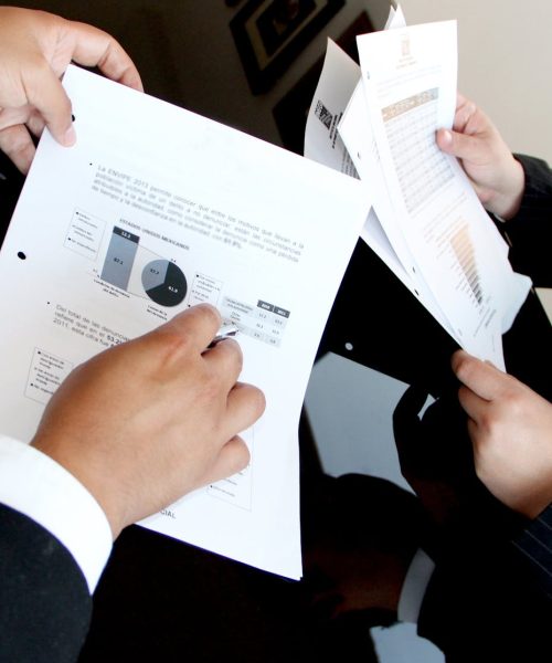 Photo by Pixabay A business team reviewing charts and graphs on documents, emphasizing data analysis and teamwork.